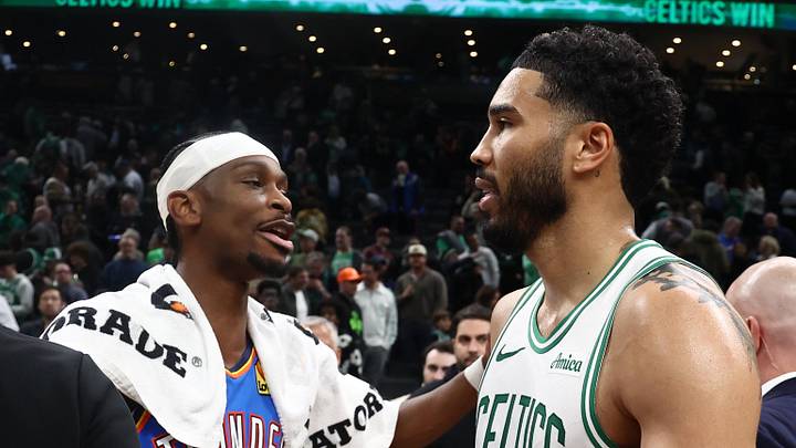Mar 25, 2026; Boston, Massachusetts, USA; Oklahoma City Thunder guard Shai Gilgeous-Alexander (2) talks with Boston Celtics forward Jayson Tatum (0) after their game at TD Garden. Mandatory Credit: Winslow Townson-Imagn Images