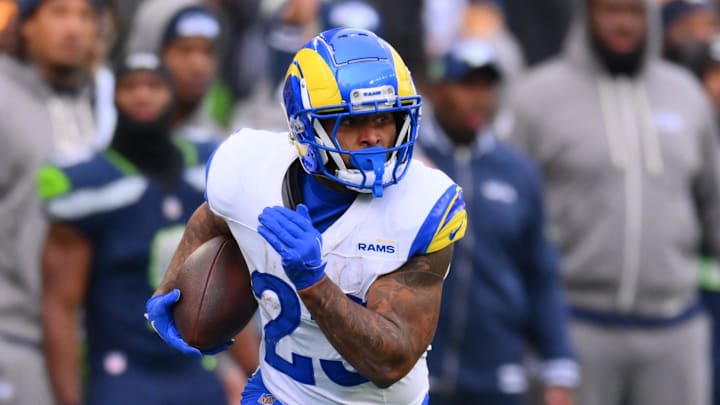 Nov 3, 2024; Seattle, Washington, USA; Los Angeles Rams running back Kyren Williams (23) carries the ball after a catch against the Seattle Seahawks during the first half at Lumen Field. Mandatory Credit: Steven Bisig-Imagn Images