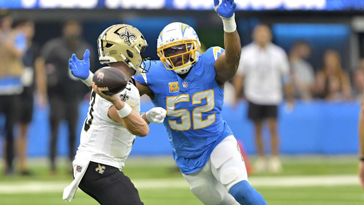 Oct 27, 2024; Inglewood, California, USA;  Los Angeles Chargers linebacker Khalil Mack (52) forces New Orleans Saints quarterback Jake Haener (3) to throw an incomplete pass in the second half at SoFi Stadium. Mandatory Credit: Jayne Kamin-Oncea-Imagn Images