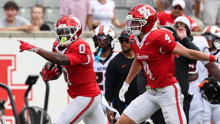 Sep 5, 2026; Houston, Texas, USA; Houston Cougars wide receiver Amare Thomas (0) points as he runs for a touchdown during the first quarter against the Oregon State Beavers at TDECU Stadium. Mandatory Credit: Troy Taormina-Imagn Images Sep 5, 2026; Houston, Texas, USA; Houston Cougars wide receiver Amare Thomas (0) points as he runs for a touchdown during the first quarter against the Oregon State Beavers at TDECU Stadium. Mandatory Credit: Troy Taormina-Imagn Images