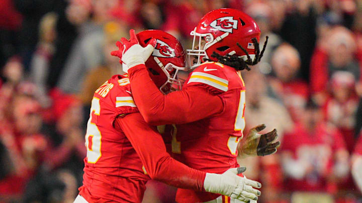 Oct 27, 2025; Kansas City, Missouri, USA; Kansas City Chiefs defensive end George Karlaftis (56) and defensive end Michael Danna (51) celebrate after a sack against the Washington Commanders during the third quarter of the game at GEHA Field at Arrowhead Stadium. Mandatory Credit: Jay Biggerstaff-Imagn Images