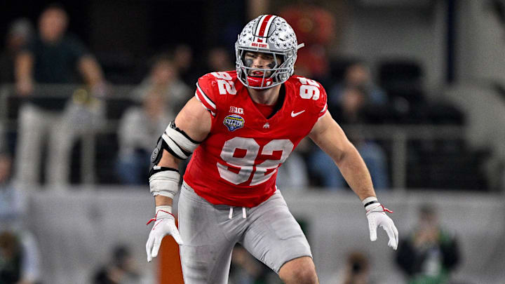 Dec 31, 2025; Arlington, TX, USA; Ohio State Buckeyes defensive end Caden Curry (92) rushes the line during the 2025 Cotton Bowl and quarterfinal game of the College Football Playoff at AT&T Stadium. Mandatory Credit: Jerome Miron-Imagn Images