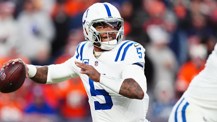 Dec 15, 2024; Denver, Colorado, USA; Indianapolis Colts quarterback Anthony Richardson (5) prepares to pass the ball in the second half against the Denver Broncos at Empower Field at Mile High. Mandatory Credit: Ron Chenoy-Imagn Images