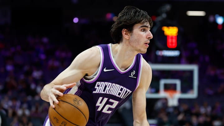 Mar 19, 2026; Sacramento, California, USA; Sacramento Kings center Maxime Raynaud (42) dribbles the ball during the fourth quarter against the Philadelphia 76ers at Golden 1 Center. Mar 19, 2026; Sacramento, California, USA; Sacramento Kings center Maxime Raynaud (42) dribbles the ball during the fourth quarter against the Philadelphia 76ers at Golden 1 Center.