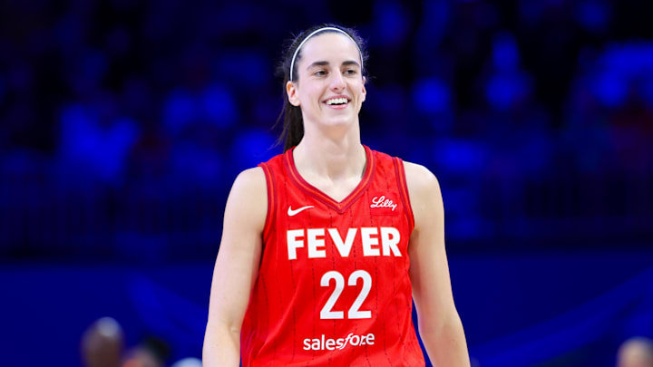 Indiana Fever guard Caitlin Clark (22) reacts during the first half against the Dallas Wings at College Park Center.