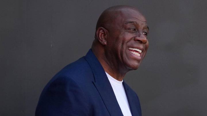 Feb 22, 2026; Los Angeles, CA, USA; Magic Johnson (left) and Jeanie Buss at unveiling of statue of former Los Angeles Lakers coach Pat Riley at the Crypto.com Arena.  Mandatory Credit: Kirby Lee-Imagn Images