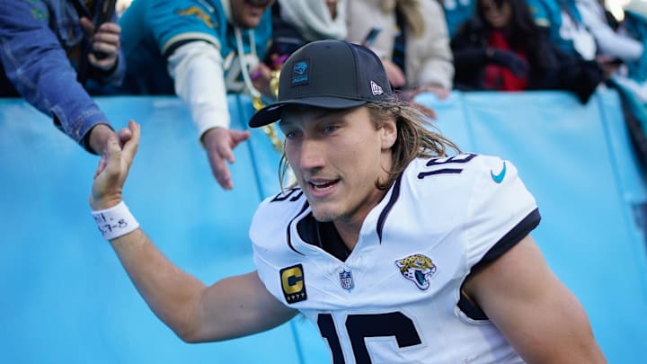 Jacksonville Jaguars quarterback Trevor Lawrence (16) celebrates the victory over the Tennessee Titans after the game at Nissan Stadium in Nashville, Tenn., Sunday, Nov. 30, 2025. Jacksonville Jaguars quarterback Trevor Lawrence (16) celebrates the victory over the Tennessee Titans after the game at Nissan Stadium in Nashville, Tenn., Sunday, Nov. 30, 2025.
