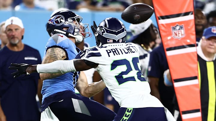 Aug 17, 2024; Nashville, Tennessee, USA; Tennessee Titans wide receiver Mason Kinsey (12) and Seattle Seahawks cornerback Nehemiah Pritchett (28) in the fourth quarter at Nissan Stadium. Mandatory Credit: Casey Gower-Imagn Images Aug 17, 2024; Nashville, Tennessee, USA; Tennessee Titans wide receiver Mason Kinsey (12) and Seattle Seahawks cornerback Nehemiah Pritchett (28) in the fourth quarter at Nissan Stadium. Mandatory Credit: Casey Gower-Imagn Images