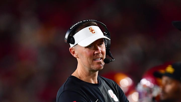 Sep 20, 2025; Los Angeles, California, USA; Southern California Trojans head coach Lincoln Riley speaks with the official during the second half at the Los Angeles Memorial Coliseum. Mandatory Credit: Gary A. Vasquez-Imagn Images
