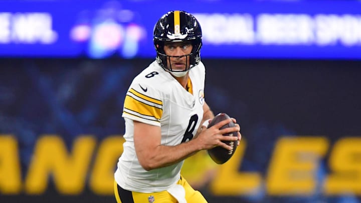 Nov 9, 2025; Inglewood, California, USA; Pittsburgh Steelers quarterback Aaron Rodgers (8) scrambles with the ball against the Los Angeles Chargers during the first quarter of the game at SoFi Stadium. Mandatory Credit: Gary A. Vasquez-Imagn Images