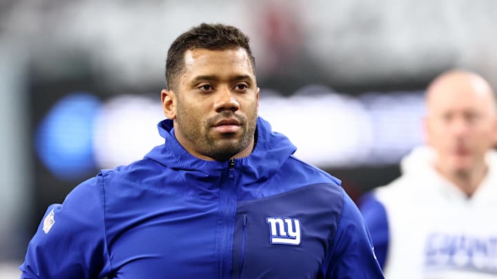 Sep 14, 2025; Arlington, Texas, USA; New York Giants quarterback Russell Wilson (3) warms up before the game against the Dallas Cowboys at AT&T Stadium. 