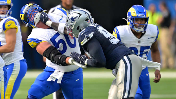 Los Angeles Rams center Beaux Limmer and Dallas Cowboys defensive tackle Perrion Winfrey battle on the line 