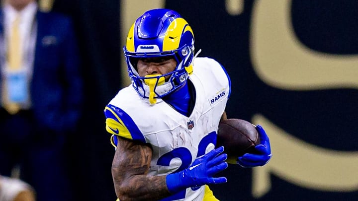 Dec 1, 2024; New Orleans, Louisiana, USA;  Los Angeles Rams running back Kyren Williams (23) rushes against the New Orleans Saints during the first half at Caesars Superdome. Mandatory Credit: Stephen Lew-Imagn Images
