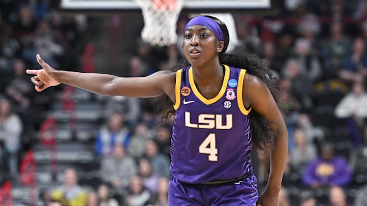 Mar 30, 2025; Spokane, WA, USA; LSU Lady Tigers guard Flau'Jae Johnson (4) reacts after play against the UCLA Bruins during the first half of a Elite 8 NCAA Tournament basketball game at Spokane Arena. Mandatory Credit: James Snook-Imagn Images