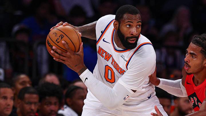 Oct 15, 2026; New York, New York, USA;  New York Knicks center Andre Drummond (0) is guarded by Toronto Raptors power forward Collin Murray-Boyles (30) during the first half at Madison Square Garden.  Mandatory Credit: Vincent Carchietta-Imagn Images