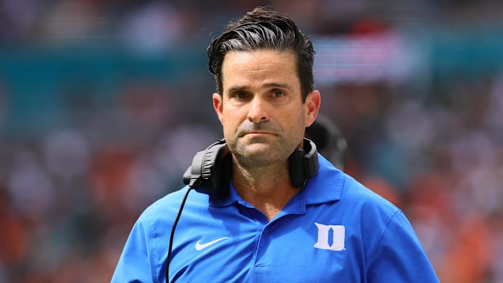 Nov 2, 2024; Miami Gardens, Florida, USA; Duke Blue Devils head coach Manny Diaz watches from the sideline against the Miami Hurricanes during the second quarter at Hard Rock Stadium. Mandatory Credit: Sam Navarro-Imagn Images
