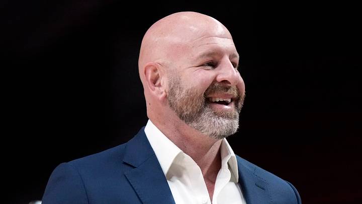 Oct 25, 2024; Portland, Oregon, USA; Portland Trail Blazers general manager Joe Cronin smiles as players warm up before a game against the New Orleans Pelicans at Moda Center. Mandatory Credit: Soobum Im-Imagn Images