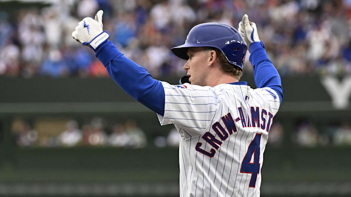 Jul 6, 2025; Chicago, Illinois, USA; Chicago Cubs outfielder Pete Crow-Armstrong (4) signals a thumbs up after hitting an RBI single against the St. Louis Cardinals during the first inning at Wrigley Field. Jul 6, 2025; Chicago, Illinois, USA; Chicago Cubs outfielder Pete Crow-Armstrong (4) signals a thumbs up after hitting an RBI single against the St. Louis Cardinals during the first inning at Wrigley Field.