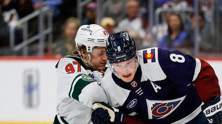 Feb 26, 2026; Denver, Colorado, USA; Colorado Avalanche defenseman Cale Makar (8) and Minnesota Wild left wing Kirill Kaprizov (97) battle for the puck in the third period at Ball Arena. Mandatory Credit: Isaiah J. Downing-Imagn Images