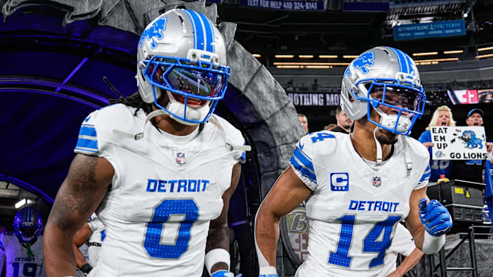 Detroit Lions running back Jahmyr Gibbs (0), left, and wide receiver Amon-Ra St. Brown (14) take the field for warm up ahead of game against Baltimore Ravens at M&T Bank Stadium in Baltimore, Md. on Monday, Sept. 22, 2025.
