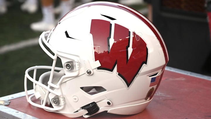 Sep 9, 2023; Pullman, Washington, USA; Wisconsin Badgers helmet sits during a game against the Washington State Cougars in the first half at Gesa Field at Martin Stadium. Sep 9, 2023; Pullman, Washington, USA; Wisconsin Badgers helmet sits during a game against the Washington State Cougars in the first half at Gesa Field at Martin Stadium.