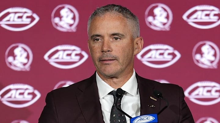 Jul 23, 2025; Charlotte, NC, USA; Florida State head coach Mike Norvell answers questions from the media during ACC Media days at Hilton Charlotte Uptown. Mandatory Credit: Jim Dedmon-Imagn Images