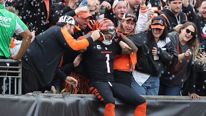 Dec 28, 2025; Cincinnati, Ohio, USA; Cincinnati Bengals wide receiver Ja'Marr Chase (1) celebrates after a touchdown during the first half against the Arizona Cardinals at Paycor Stadium. Mandatory Credit: Joseph Maiorana-Imagn Images