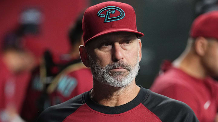 Arizona Diamondbacks manager Torey Lovullo watches his team from the dugout as they play the Seattle Mariners at Chase Field in Phoenix on June 10, 2025. Arizona Diamondbacks manager Torey Lovullo watches his team from the dugout as they play the Seattle Mariners at Chase Field in Phoenix on June 10, 2025.