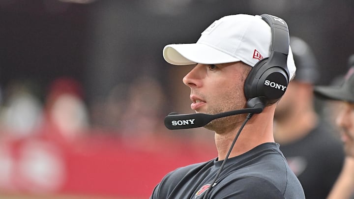 Sep 14, 2025; Glendale, Arizona, USA;  Arizona Cardinals head coach Jonathan Gannon looks on during the second quarter against the Carolina Panthers at State Farm Stadium. Mandatory Credit: Matt Kartozian-Imagn Images