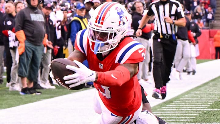 Oct 13, 2024; Foxborough, Massachusetts, USA; New England Patriots wide receiver DeMario Douglas (3) scores a touchdown against the Houston Texans during the second half at Gillette Stadium. Mandatory Credit: Brian Fluharty-Imagn Images