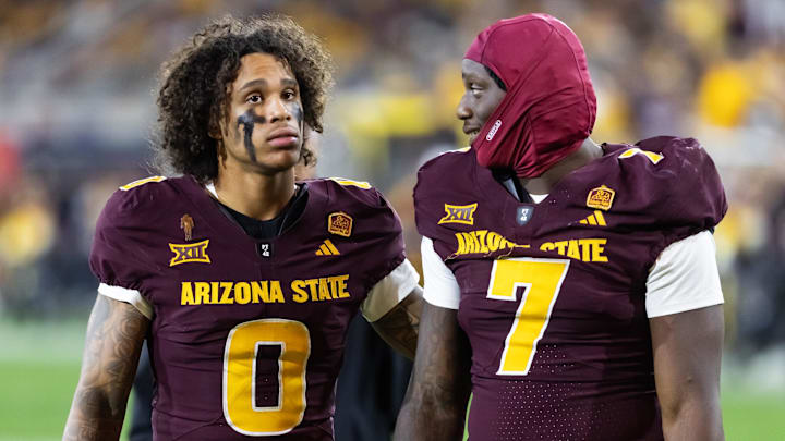 Nov 28, 2025; Tempe, Arizona, USA; Arizona State Sun Devils wide receiver Jordyn Tyson (0) with tight end Chamon Metayer (7) against the Arizona Wildcats during the 99th Territorial Cup at Mountain America Stadium. Mandatory Credit: Mark J. Rebilas-Imagn Images