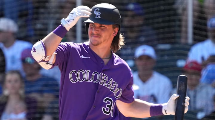Colorado Rockies center fielder Jake McCarthy (31) hits. Colorado Rockies center fielder Jake McCarthy (31) hits.