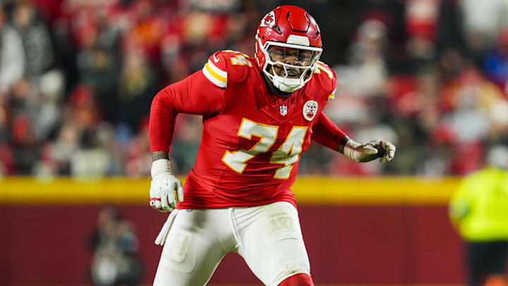 Dec 8, 2024; Kansas City, Missouri, USA; Kansas City Chiefs offensive tackle Jawaan Taylor (74) gets ready to block during the second half against the Los Angeles Chargers at GEHA Field at Arrowhead Stadium. Mandatory Credit: Jay Biggerstaff-Imagn Images