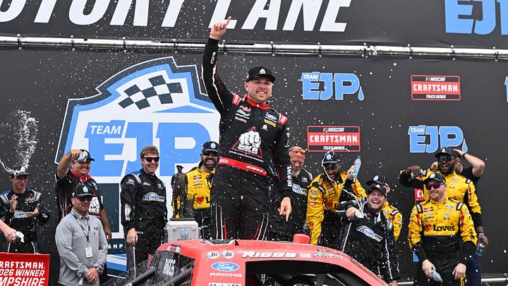 Aug 22, 2026; Loudon, New Hampshire, USA; Front Row Motorsports driver Layne Riggs (34) celebrates winning the Team EJP 175 at New Hampshire Motor Speedway. 