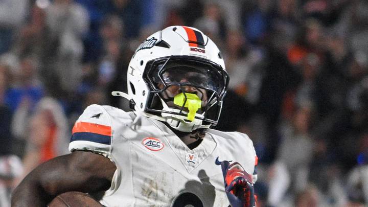 Nov 15, 2025; Durham, North Carolina, USA;  Virginia Cavaliers running back J'Mari Taylor (3) scores a touchdown against the Duke Blue Devils during the third quarter at Wallace Wade Stadium. Mandatory Credit: Zachary Taft-Imagn Images