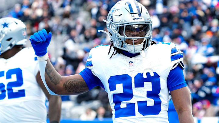 Dallas Cowboys running back Jaydon Blue (23) celebrates after scoring the first touchdown of the game, Sunday, January 4, 2026, in East Rutherford.
