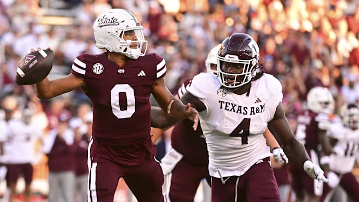 Mississippi State Bulldogs quarterback Michael Van Buren Jr. (0) drops back to pass against Texas A&M Aggies defensive lineman Shemar Stewart (4) during the third quarter at Davis Wade Stadium at Scott Field.