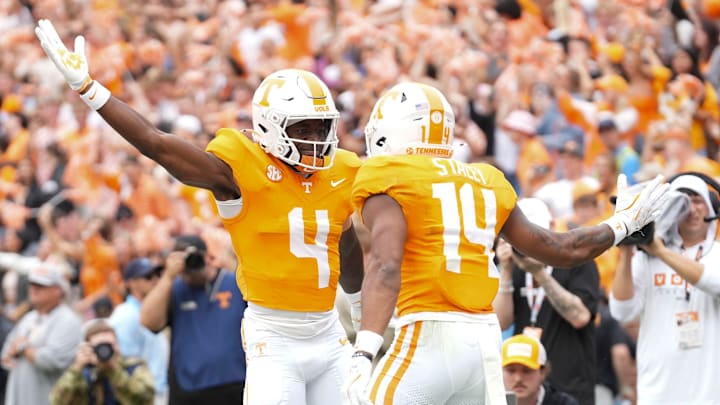 Tennessee wide receivers Mike Matthews (4) and Braylon Staley (14) celebrate Staley's touchdown during an NCAA college football game against ETSU on September 6, 2025, in Knoxville, Tennessee.