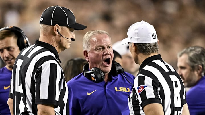 Oct 26, 2024; College Station, Texas, USA; LSU Tigers head coach Brian Kelly speaks with the officials during a time out in the second quarter against the LSU Tigers at Kyle Field. Oct 26, 2024; College Station, Texas, USA; LSU Tigers head coach Brian Kelly speaks with the officials during a time out in the second quarter against the LSU Tigers at Kyle Field.