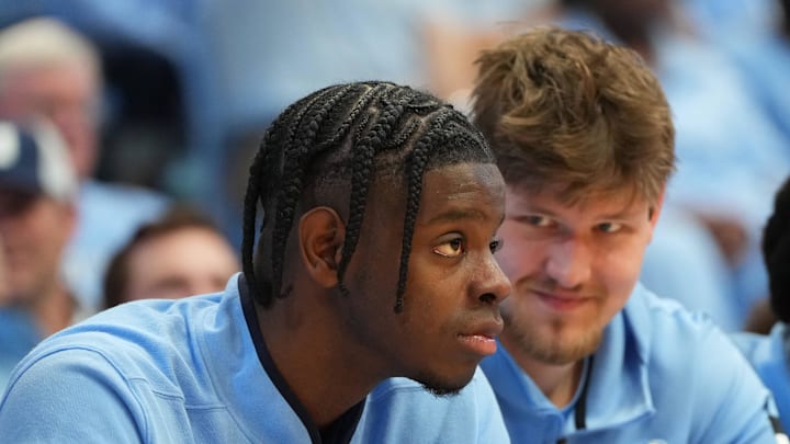 Feb 14, 2026; Chapel Hill, North Carolina, USA; North Carolina Tar Heels forward Caleb Wilson (8) and center Henri Veesaar (13) on the bench in the second half at Dean E. Smith Center. Mandatory Credit: Bob Donnan-Imagn Images Feb 14, 2026; Chapel Hill, North Carolina, USA; North Carolina Tar Heels forward Caleb Wilson (8) and center Henri Veesaar (13) on the bench in the second half at Dean E. Smith Center. Mandatory Credit: Bob Donnan-Imagn Images