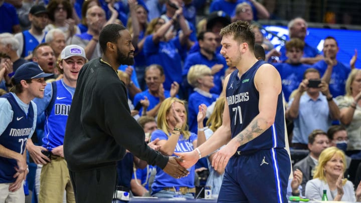 May 8, 2022; Dallas, Texas, USA; Dallas Mavericks guard Theo Pinson (1) greets guard Luka Doncic (77) as Doncic comes out of the game against the Phoenix Suns during the fourth quarter during game four of the second round for the 2022 NBA playoffs at American Airlines Center. Mandatory Credit: Jerome Miron-USA TODAY Sports May 8, 2022; Dallas, Texas, USA; Dallas Mavericks guard Theo Pinson (1) greets guard Luka Doncic (77) as Doncic comes out of the game against the Phoenix Suns during the fourth quarter during game four of the second round for the 2022 NBA playoffs at American Airlines Center. Mandatory Credit: Jerome Miron-USA TODAY Sports
