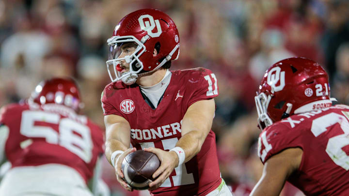 Oklahoma quarterback Jackson Arnold and running back Xavier Robinson