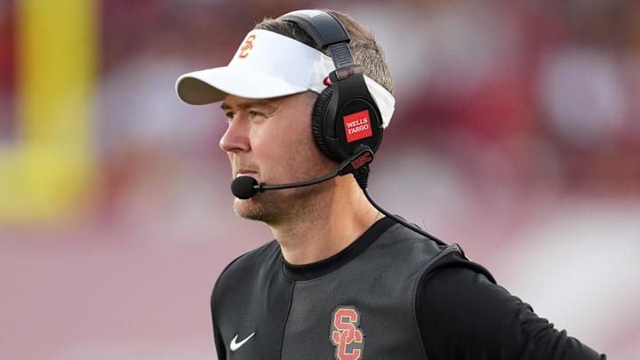 Aug 30, 2025; Los Angeles, California, USA; Southern California Trojans head coach Lincoln Riley watches from the sidelines against the Missouri State Bears in the first half at United Airlines Field at Los Angeles Memorial Coliseum. Mandatory Credit: Kirby Lee-Imagn Images