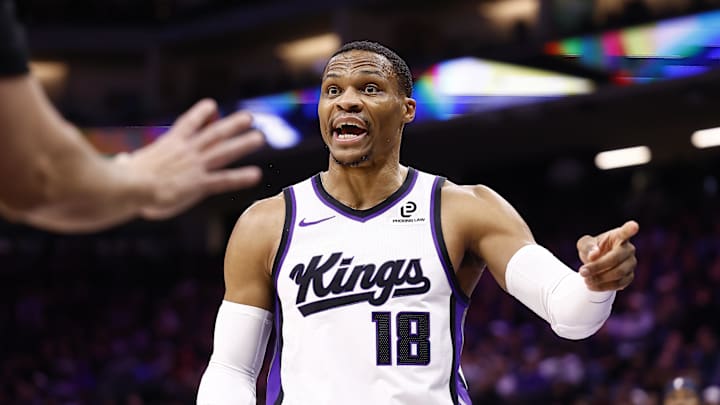 Nov 30, 2025; Sacramento, California, USA; Sacramento Kings guard Russell Westbrook (18) reacts towards the referee after a play against the Memphis Grizzlies during the fourth quarter at Golden 1 Center.