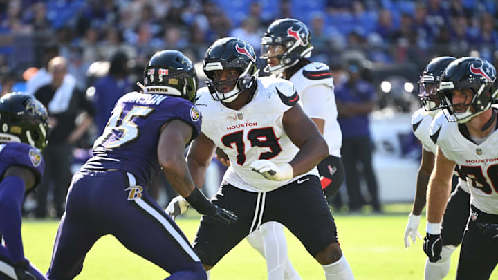 Oct 5, 2025; Baltimore, Maryland, USA; Houston Texans offensive tackle Aireontae Ersery (79) defends against Baltimore Ravens linebacker Tavius Robinson (95) during the fourth quarter at M&T Bank Stadium. Mandatory Credit: Rafael Suanes-Imagn Images
