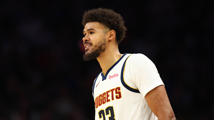 Nov 29, 2025; Phoenix, Arizona, USA; Denver Nuggets forward Cameron Johnson (23) against the Phoenix Suns at the Mortgage Matchup Center.