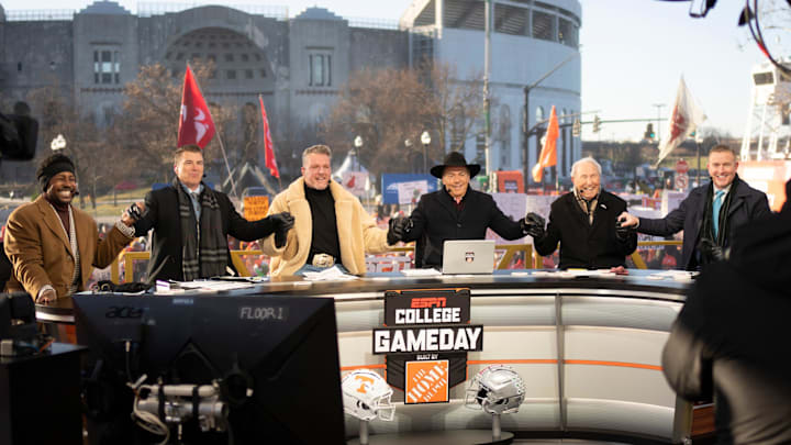 ESPN cast, from left, Desmond Howard, Rece Davis, Pat McAfee, Nick Saban, Lee Corso and Kirk Herbstreit sit on the set of College GameDay prior to the College Football Playoff first round game between the Ohio State Buckeyes and Tennessee Volunteers in Columbus on Dec. 21, 2024. ESPN cast, from left, Desmond Howard, Rece Davis, Pat McAfee, Nick Saban, Lee Corso and Kirk Herbstreit sit on the set of College GameDay prior to the College Football Playoff first round game between the Ohio State Buckeyes and Tennessee Volunteers in Columbus on Dec. 21, 2024.