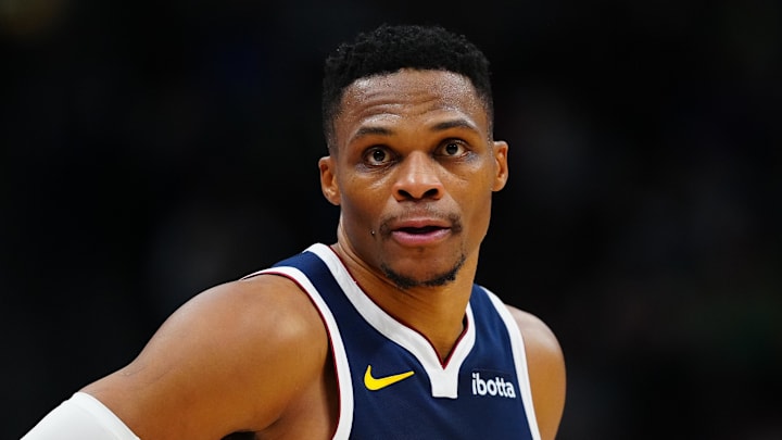 Nov 6, 2024; Denver, Colorado, USA; Denver Nuggets guard Russell Westbrook (4) during the first quarter against the Oklahoma City Thunder at Ball Arena. Mandatory Credit: Ron Chenoy-Imagn Images