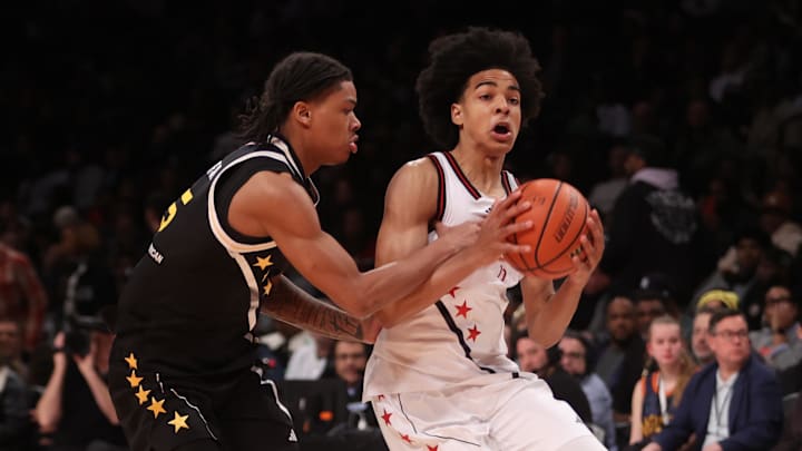 Apr 1, 2025; Brooklyn, NY, USA; McDonald's All American West guard Mikel Brown Jr. (11) dribbles the ball against McDonald's All American East guard Darius Acuff Jr. (5) during the first half of the game at Barclays Center. Mandatory Credit: Pamela Smith-Imagn Images Apr 1, 2025; Brooklyn, NY, USA; McDonald's All American West guard Mikel Brown Jr. (11) dribbles the ball against McDonald's All American East guard Darius Acuff Jr. (5) during the first half of the game at Barclays Center. Mandatory Credit: Pamela Smith-Imagn Images