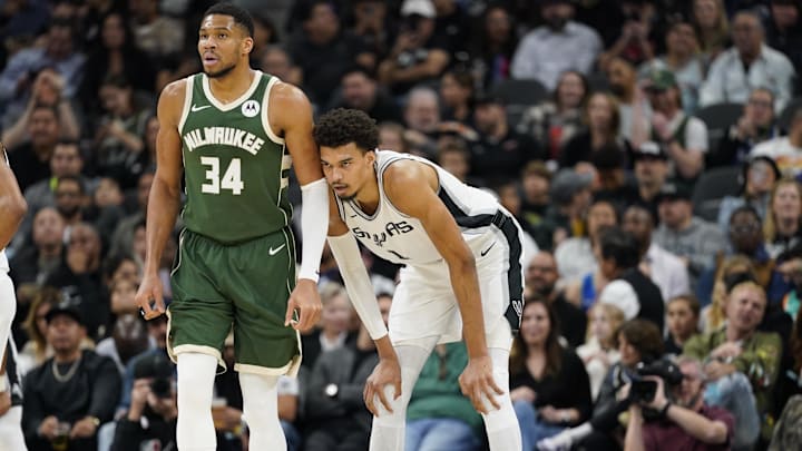 Jan 31, 2025; San Antonio, Texas, USA; Milwaukee Bucks forward Giannis Antetokounmpo (34) and San Antonio Spurs center Victor Wembanyama (1) during the first half at Frost Bank Center.